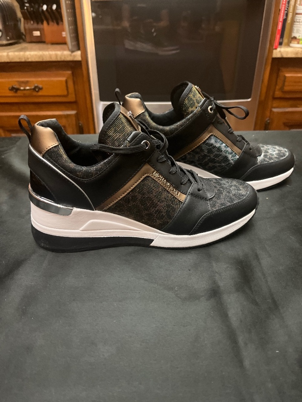 Like New Michael Kors Blk/Bronze Georgie Trainers.
